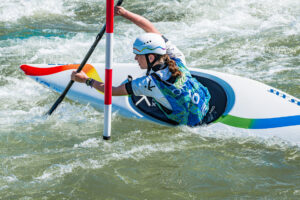 Bryan Pearson/Courtesy of the American Canoe Association A kayaker navigates waters during an event.