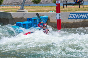Bryan Pearson/Courtesy of the American Canoe Association A kayaker navigates rough waters during an event.
