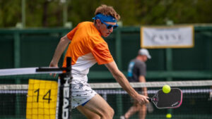 Courtesy VisitHATTIESBURG A pickleball player performs a backhand shot during a game.