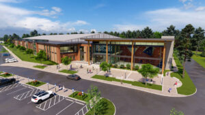 A rendering of the Williamsburg Sports & Events Center shows the exterior of the building and the parking lots. 