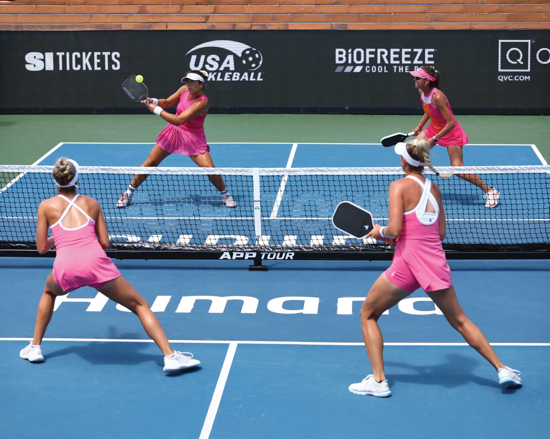 Women playing pickleball