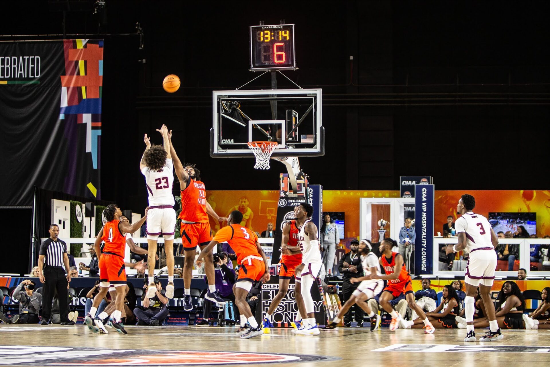 An amateur basketball game on an indoor court.