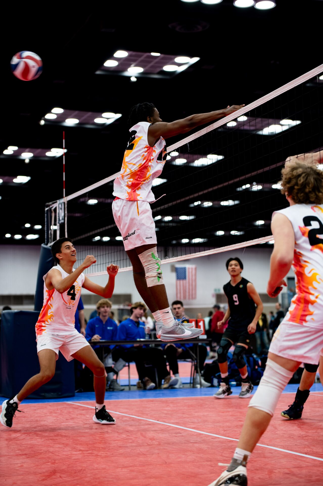 An indoor volleyball game.
