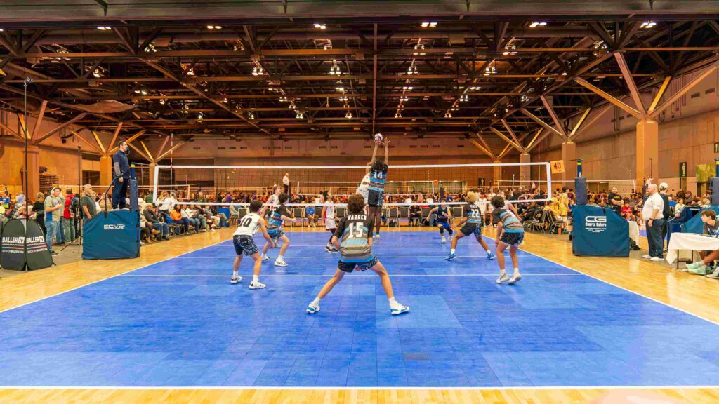 Players on the court at the Dennis Lafata volleyball tournament at the America's Center Convention Complex in St. Louis.