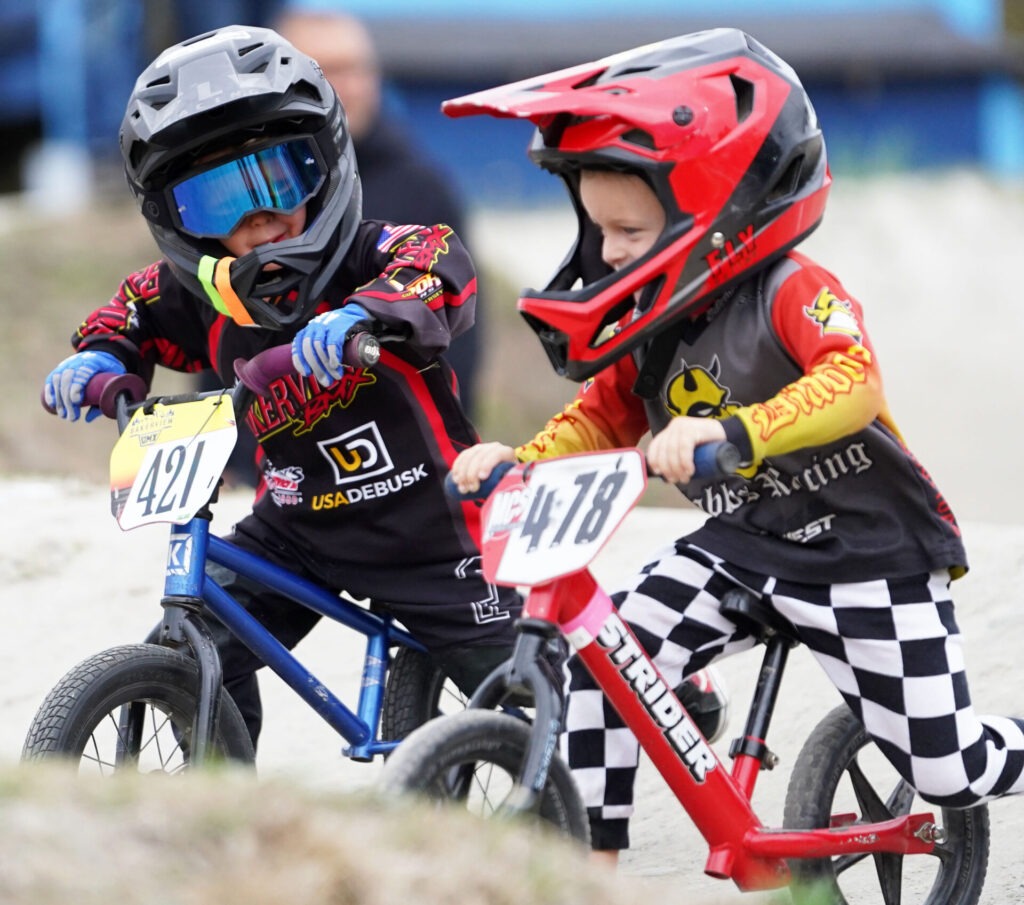Two young BMX riders.