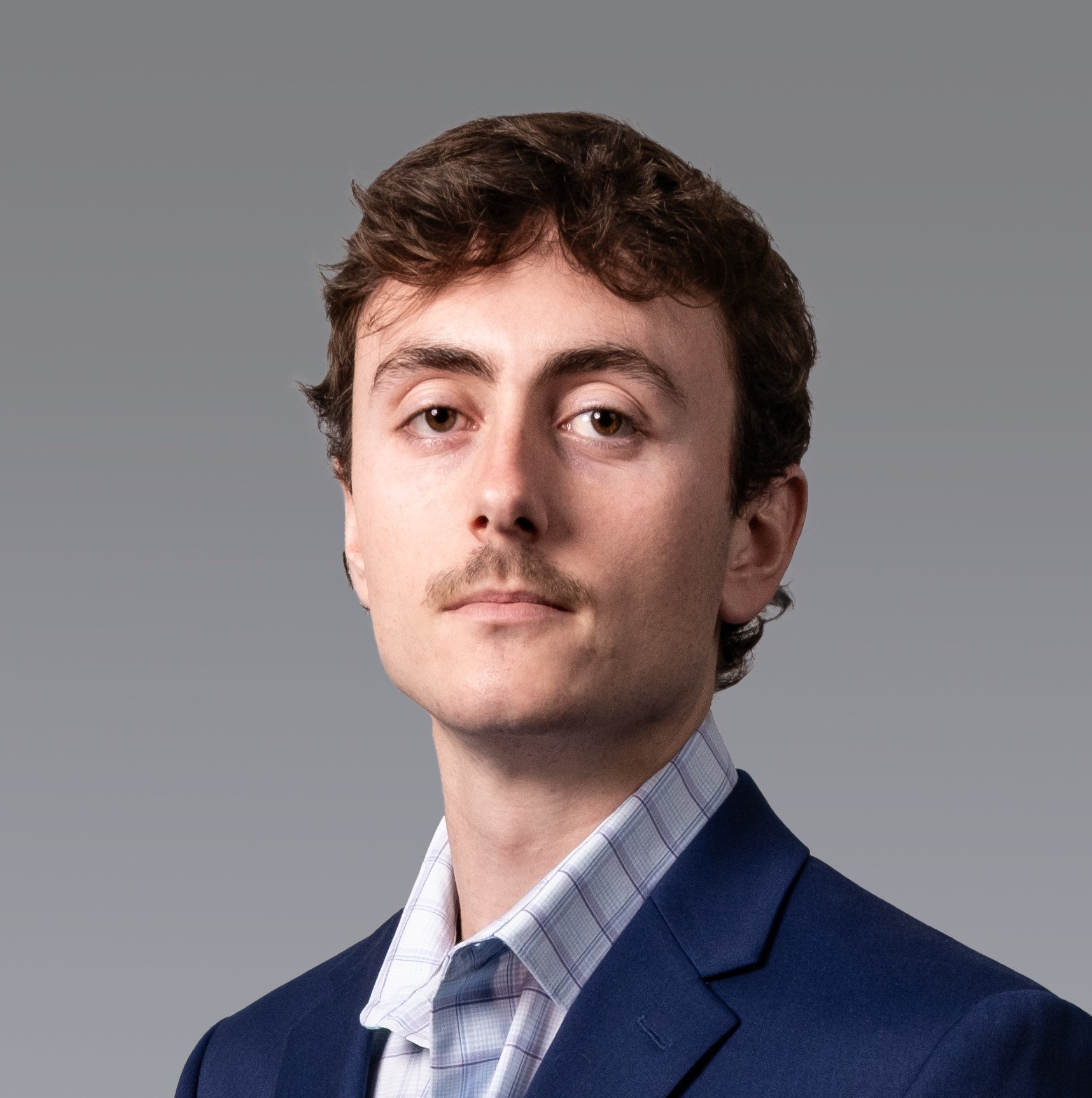 A headshot of Kyle Molivas