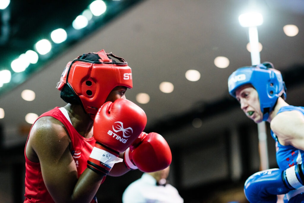 Two boxers square off in the ring.